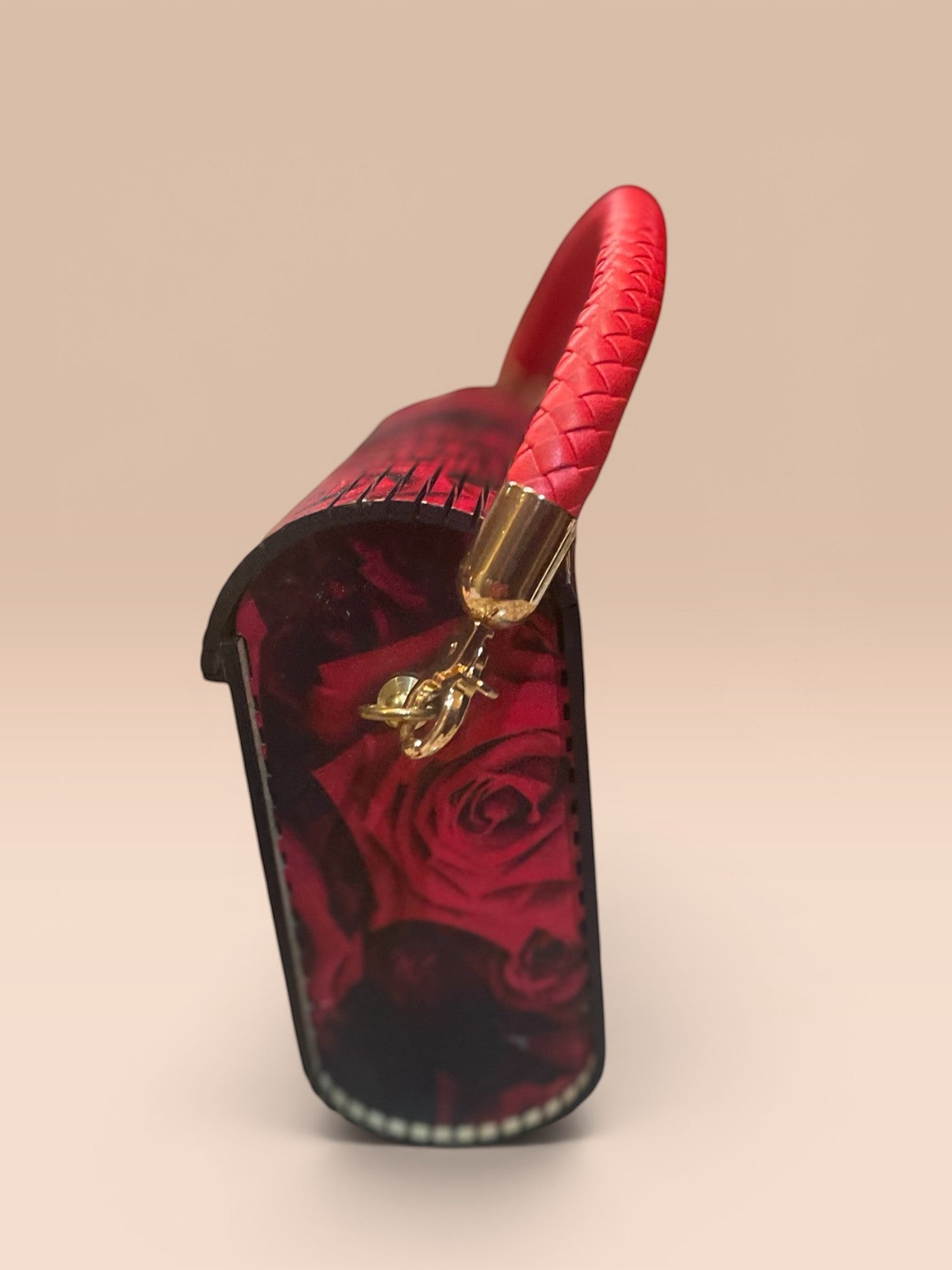 Recrafted Luxe red rose print wood handbag with braided leather handle and brass hardware.
